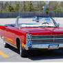 A Hot Red Plymouth Sport Fury Convertible