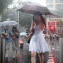 Lady in White in Rain