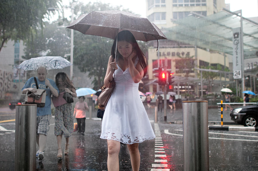 Lady in White in Rain