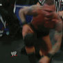 Randy Orton falls through announce table