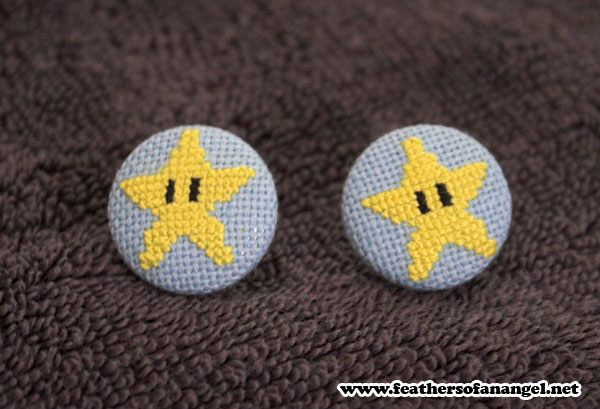 invincible star earrings