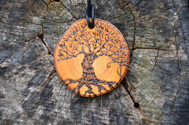 Black tree white tree round pendant