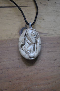 Fossilized dinosaur egg pendant