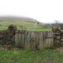 Gate and ghostly hill
