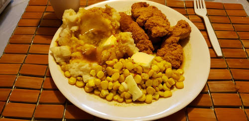 Fried chicken and mashed potatoes and gravy meal by adamnorde583