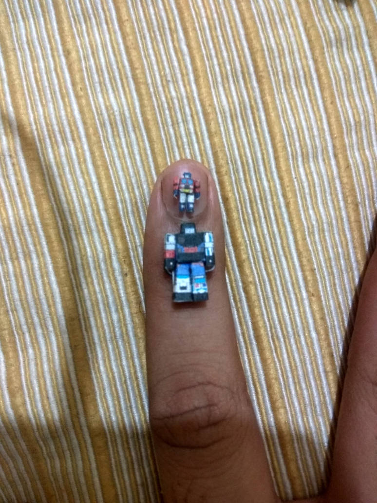 Tiny Optimus Prime and Defensor by Artzzykid on DeviantArt