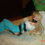 tape gagged doll laying down