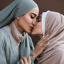 Lesbian hijab women kiss
