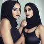 Tow ladies woman muslim with hijab kiss together d