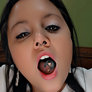 Alex enjoys a tasty tiny
