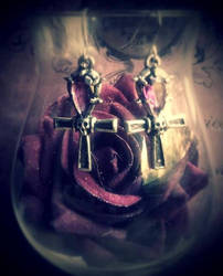skull ankh earrings with purple crystals