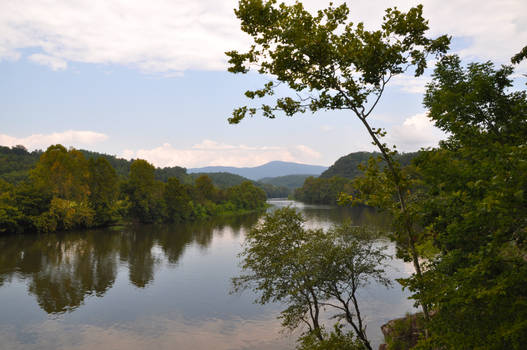 Down the River Towards the Mountains