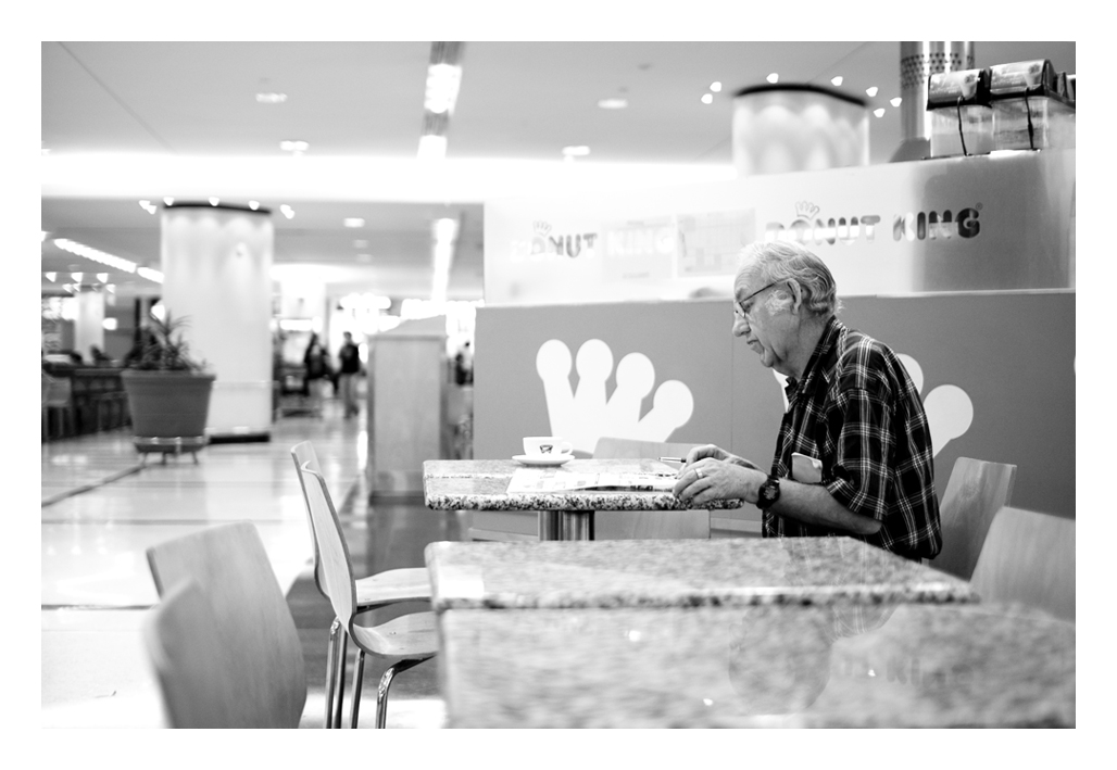 a gentleman reads the paper