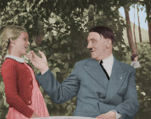 Hitler and a little girl. In colour.