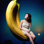 00551-1878863061-A big banana hanging in the sky l
