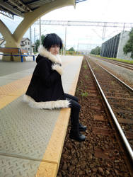 Izaya near the traintrack