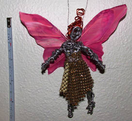 Pink winged fairy ornament by metalpug