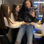 Girls give woman a wedgie lift and carry in jeans