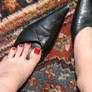 Red toes and patterned carpets