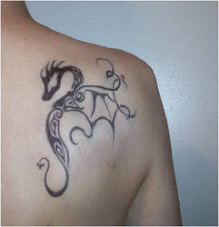 tribal dragon tattoo inked