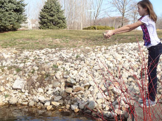 Kealy throwing rock