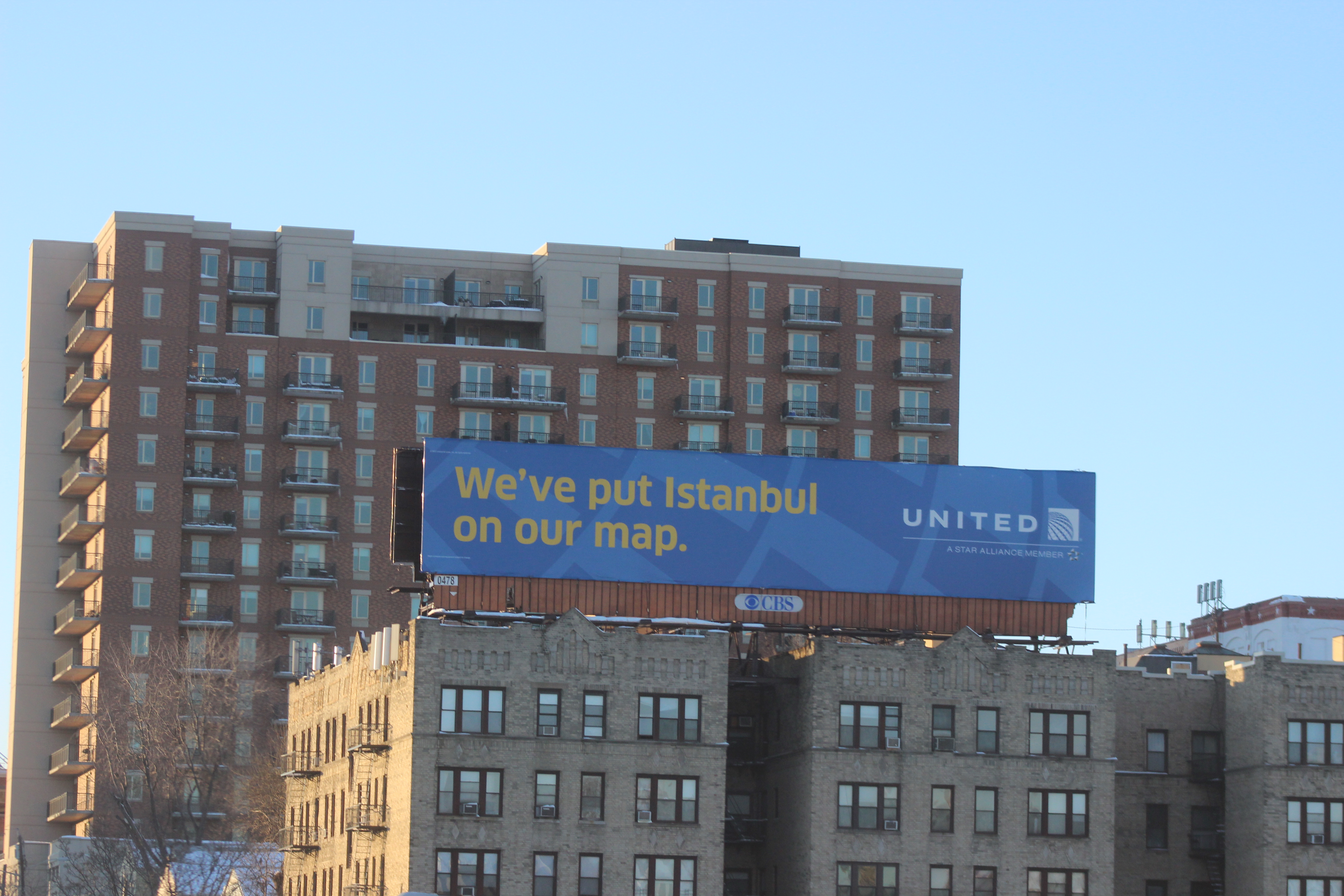 Towering Over A Billboard