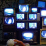 wall of vintage tvs