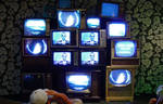 wall of vintage tvs