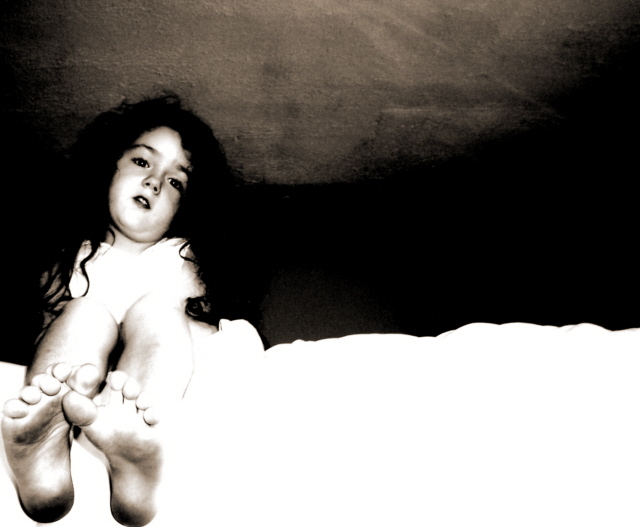 Little Girl on a Bed