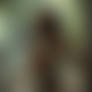 a young sexy Black woman amazone with no clothes