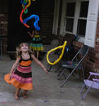 Girl Throwing Leis by Flying-To-Fall