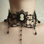 Black necklace with a cameo