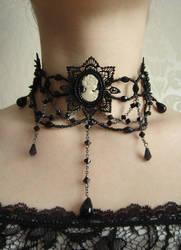 Black necklace with a cameo by Vadien