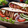 Doner Kebab In Pide Bread With Salad