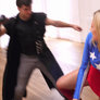 Patriot-Girl outnumbered and overcome by villains
