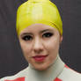 portrait of woman with yellow swim cap