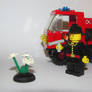 LEGO Firefighter Ready to Water Flowers