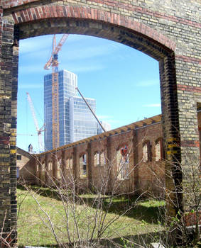 New Urban landscape seen through the ruins of the