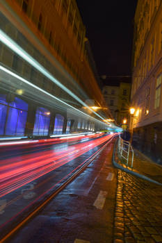 Night street with fast traffic 2