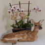 Fawn with flowers