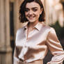 Maisie Williams wearing a satin blouse