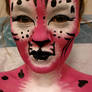 Pink leopard make up and body art