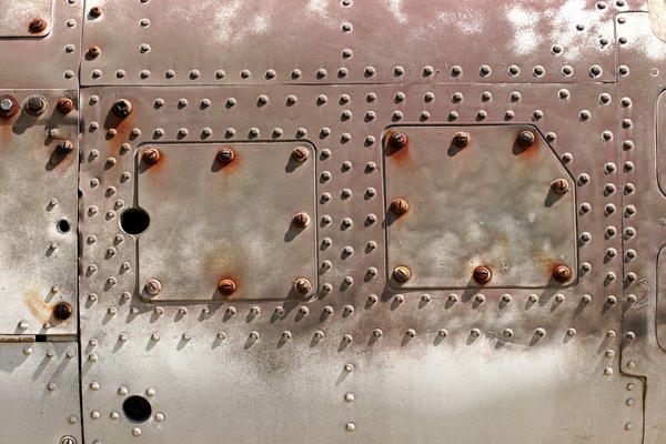 Rusty Bolts on Metal