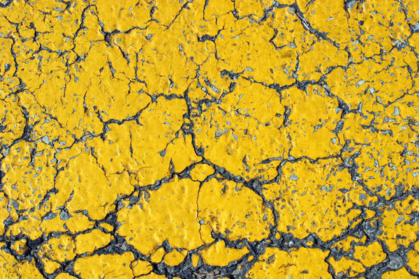 Cracked Yellow Asphalt