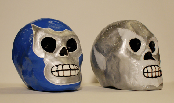 El Santo and Blue Demon skulls