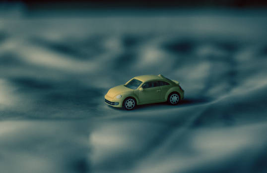 small plastic yellow car