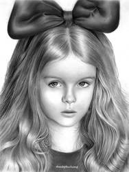 Little girl with a bow