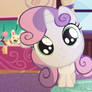 Sweetie Belle is looking into the camera