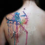 Watercolor splash tattoo