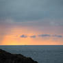 Cargo ship on horizon